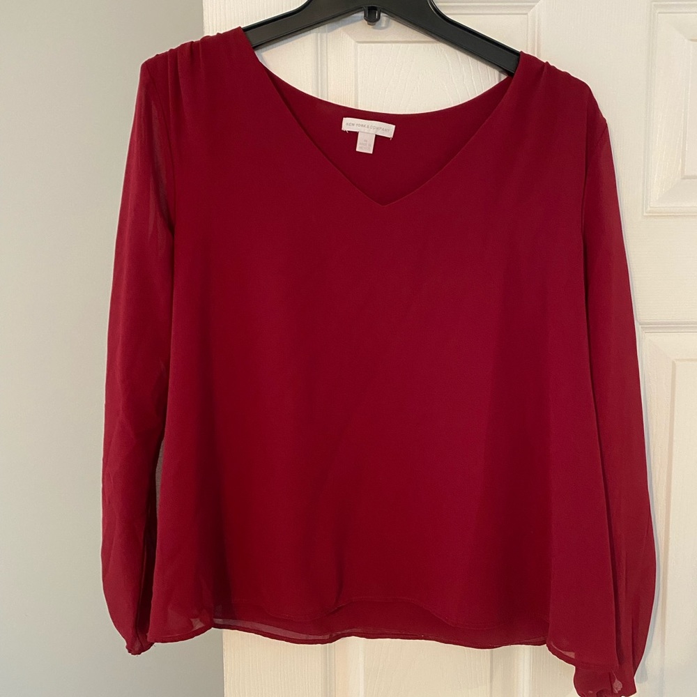 Maroon blouse with open arm holes